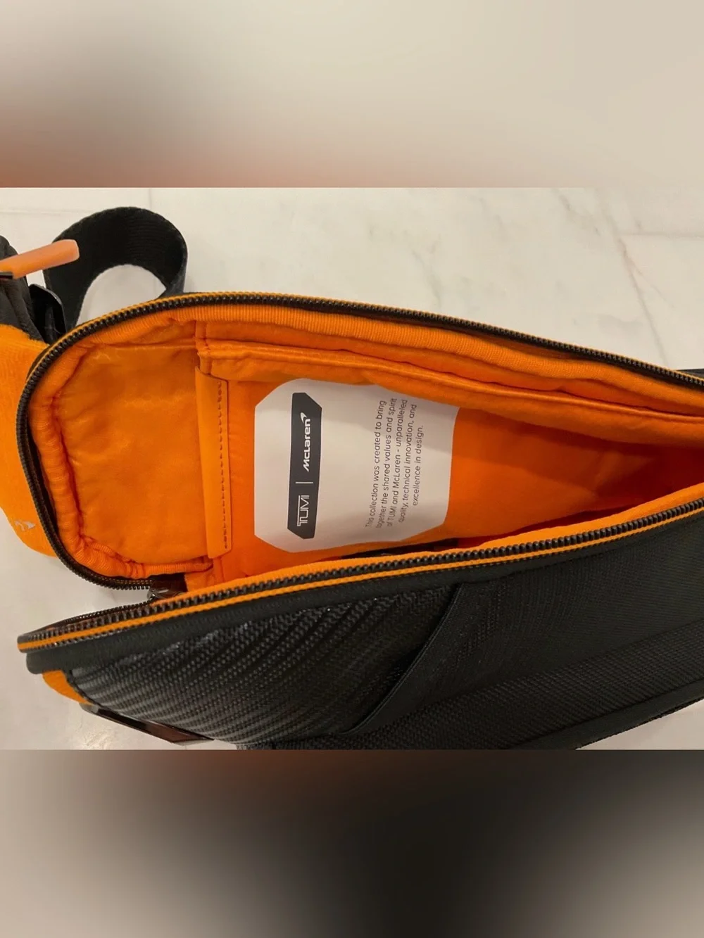 NEW Tumi McLaren Esports Downforce PRO Sling Crossbody - Black & Papaya Orange